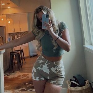 Size small, cow print shorts